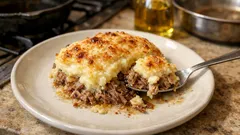 Hachis Parmentier au canard confit : purée à l’huile d’olive et gratin au parmesan