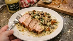 Rôti de porc aux champignons en cocotte : sauce crémeuse au vin blanc